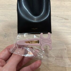 Pale pink Celine hair clip